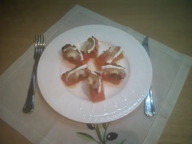 Calabaza con chile, cebolla caramelizada y queso gratinado